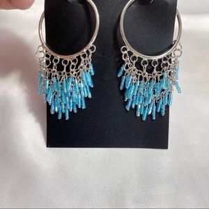 NWOT Silvertone hoops with beaded fringe post with clasp. Light blue beads.
